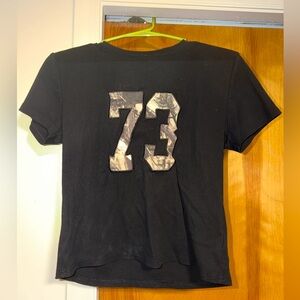 Edikted Black Short-Sleeve Tee with Marble '73' Patch